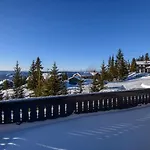 Exclusive Family In Ski-in-ski-out