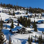 Exclusive Family In Ski-in-ski-out